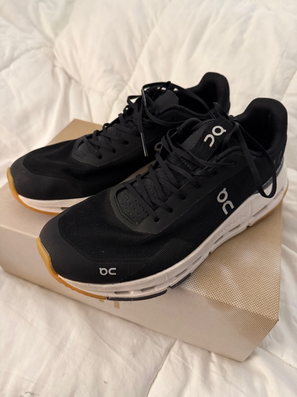 On Running Womens Cloudnova Form 2 Black Sneakers with White Midsole and Gum Toe